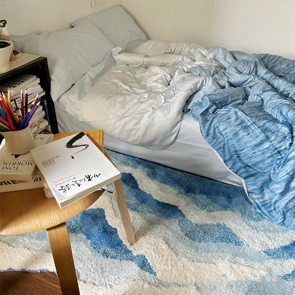 Luxurious hand-tufted 3D wave area rug, a modern polyester carpet. Textured non-slip floor accent for stylish home decor.