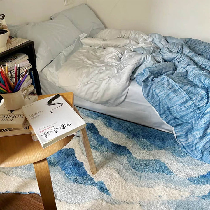 Luxurious hand-tufted 3D wave area rug, a modern polyester carpet. Textured non-slip floor accent for stylish home decor.