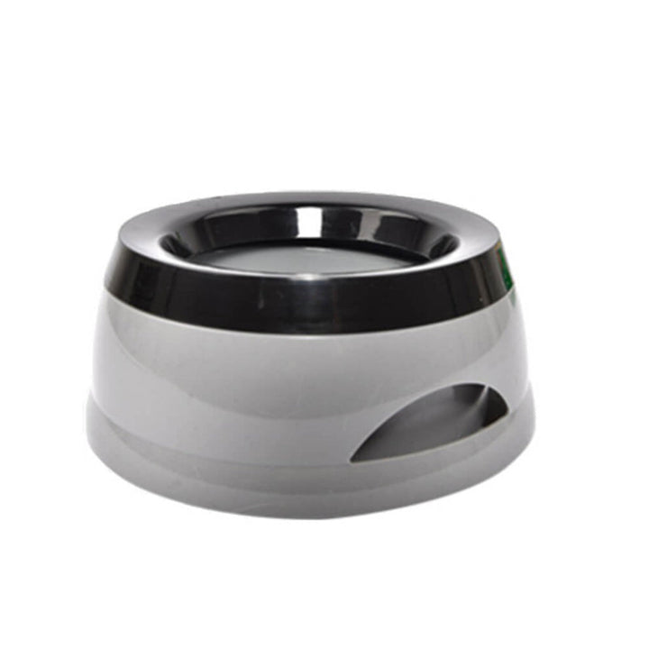 Innovative no-spill dog water bowl with floating disk, ideal for home and travel, promoting slow drinking & hydration.