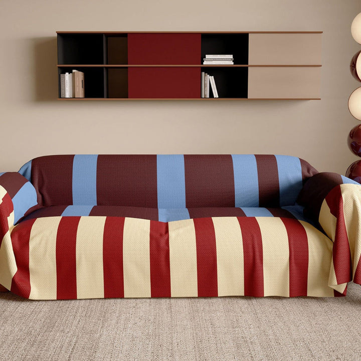 Modern striped sofa cover in vibrant Memphis style, perfect for living room home decor & couch protection.