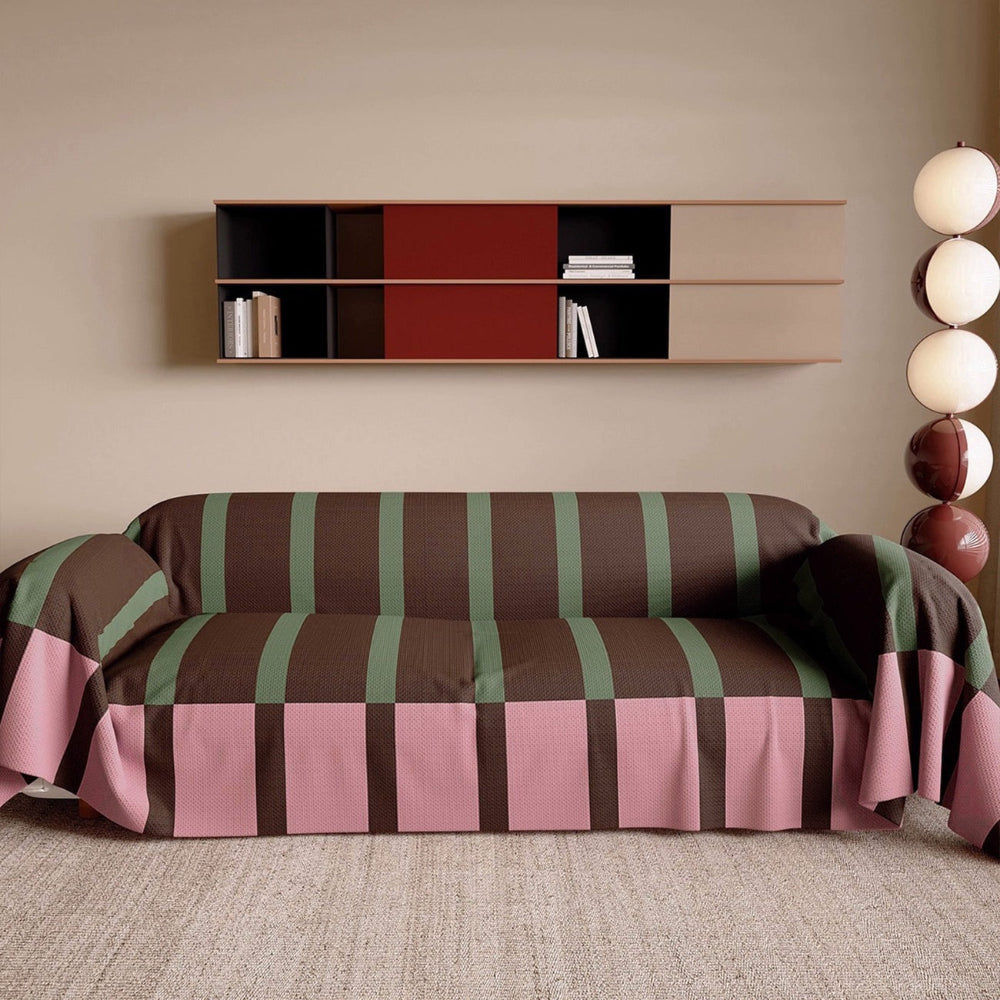 Vibrant striped sofa cover for modern living room decor. Adds a fresh aesthetic & protects your furniture.