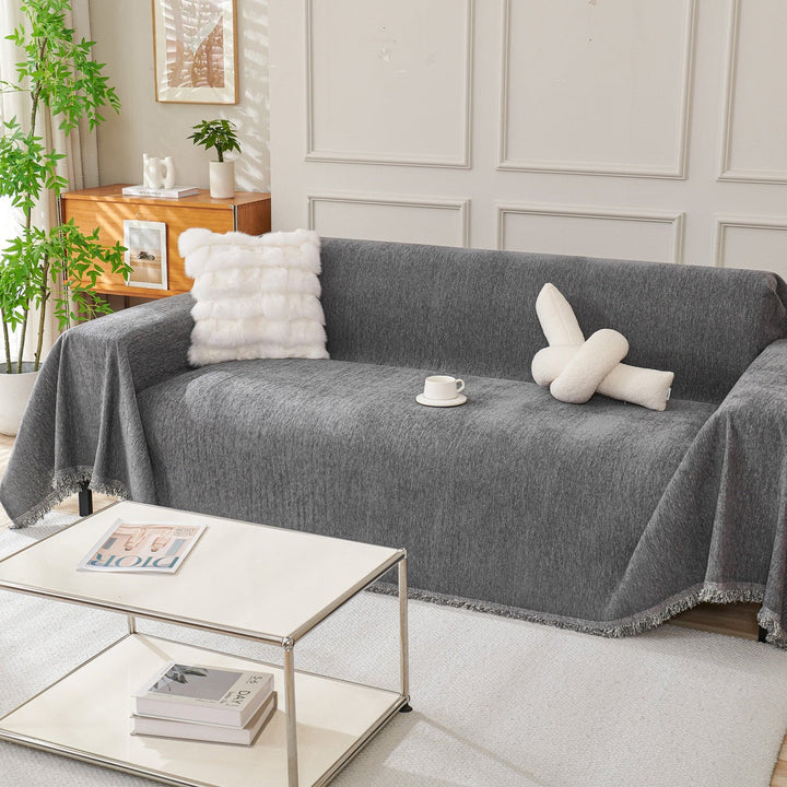Modern fabric sofa cover for living room furniture. A stylish, durable slipcover that enhances home decor.