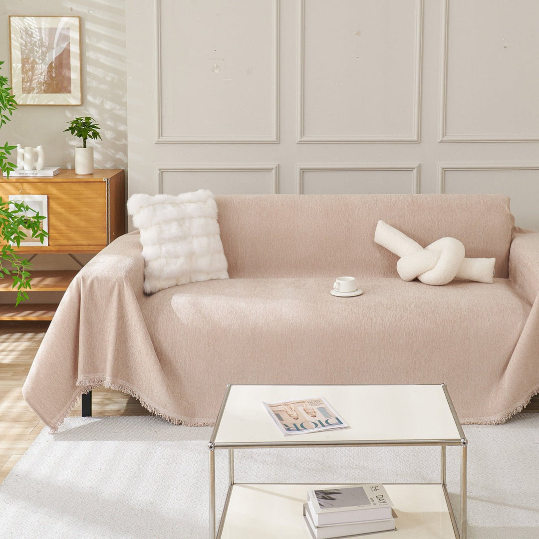Pet-friendly sofa protector slipcover for couches. Durable, machine washable fabric shield keeps furniture safe.