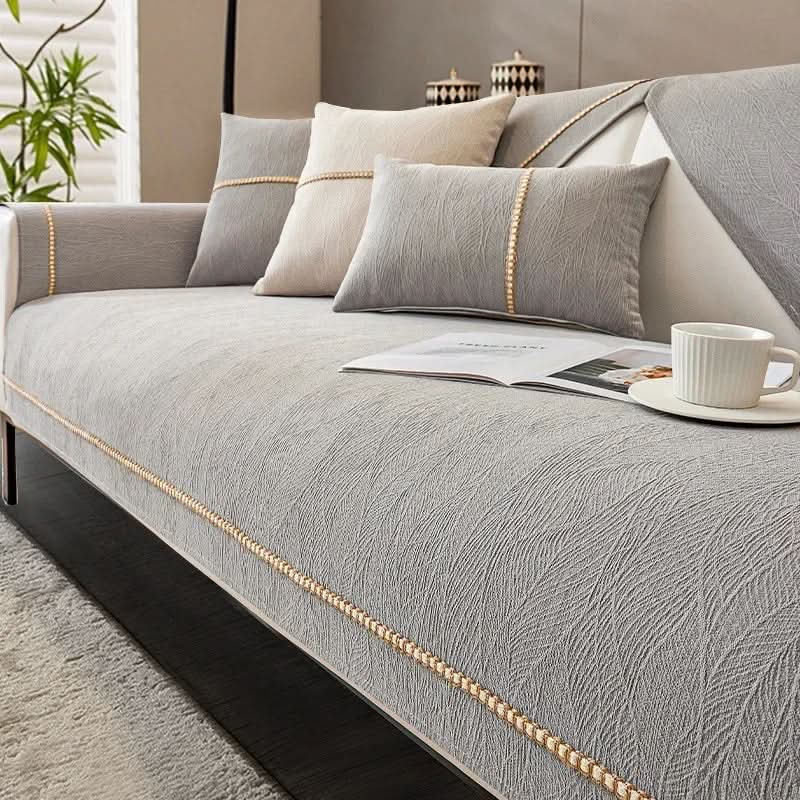 Premium non-slip sofa cover. Linen texture, pet friendly & machine washable for stylish living room protection.
