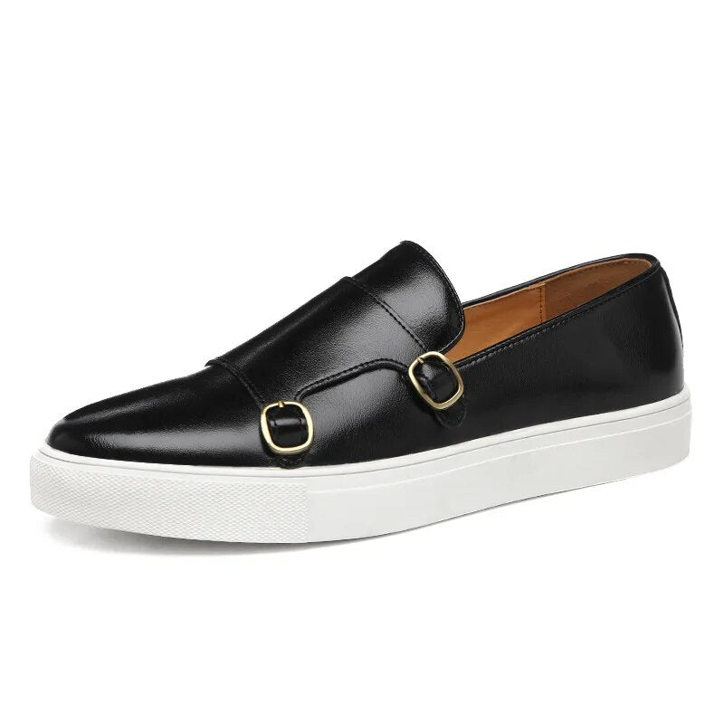 Detail of the precise stitching and finish on men's formal monk strap loafers, quality dress shoes.