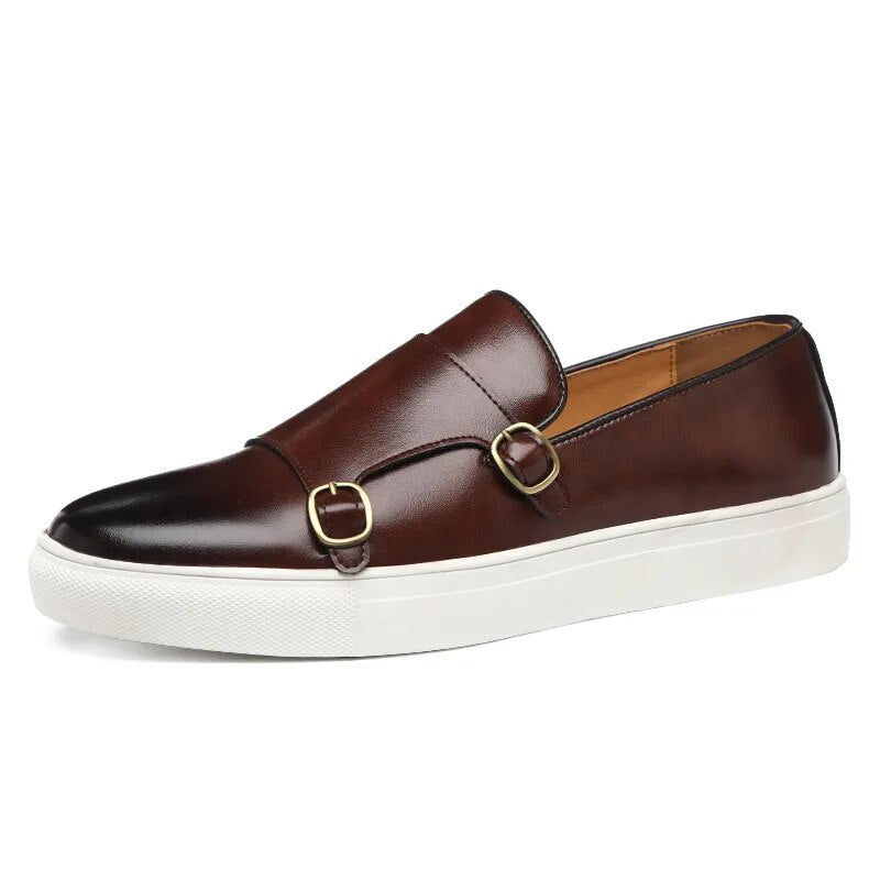 Pair of stylish men's monk strap loafers, showcasing classic design and premium comfort footwear.
