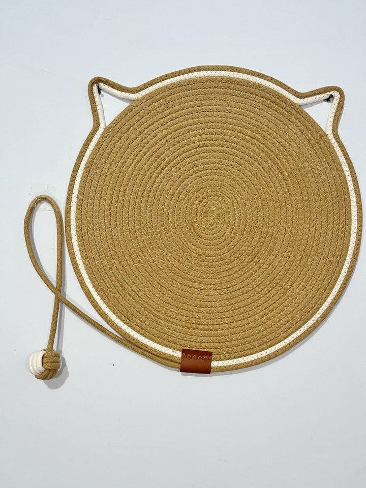 Cat scratcher and lounge pad in a living room setting, blending with home decor.