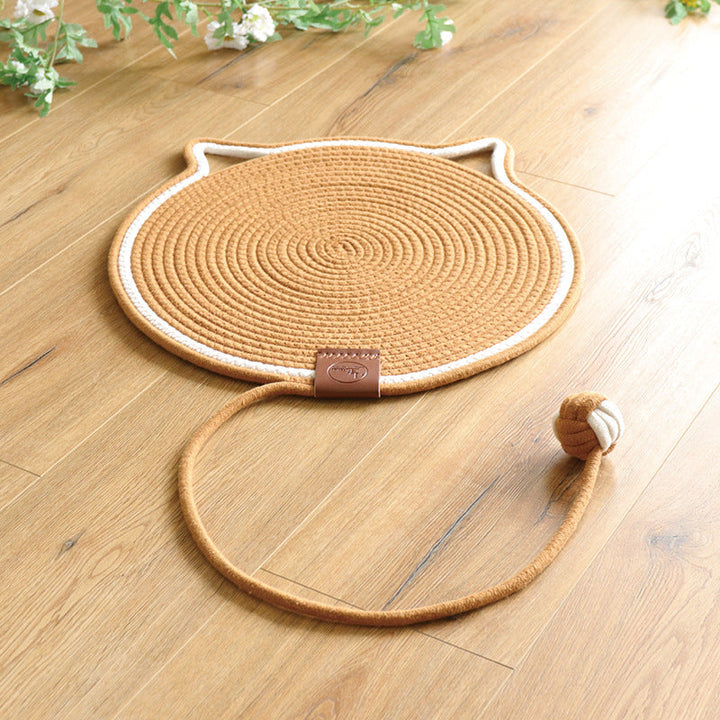 Stylish pet accessory: a cat scratching mat that doubles as a comfortable lounge pad.