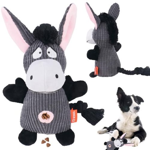 Durable red bone-shaped chew toy for aggressive dog chewers, squeaky and long-lasting canine play