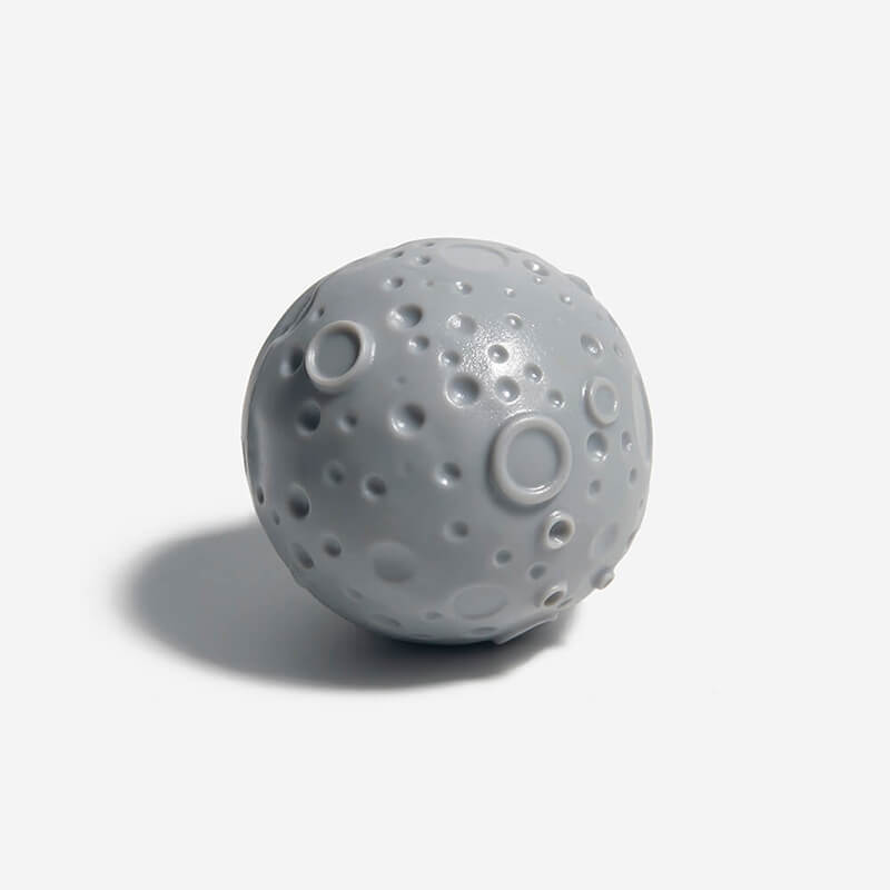 Durable red dog training treat dispensing ball toy for pet play & enrichment