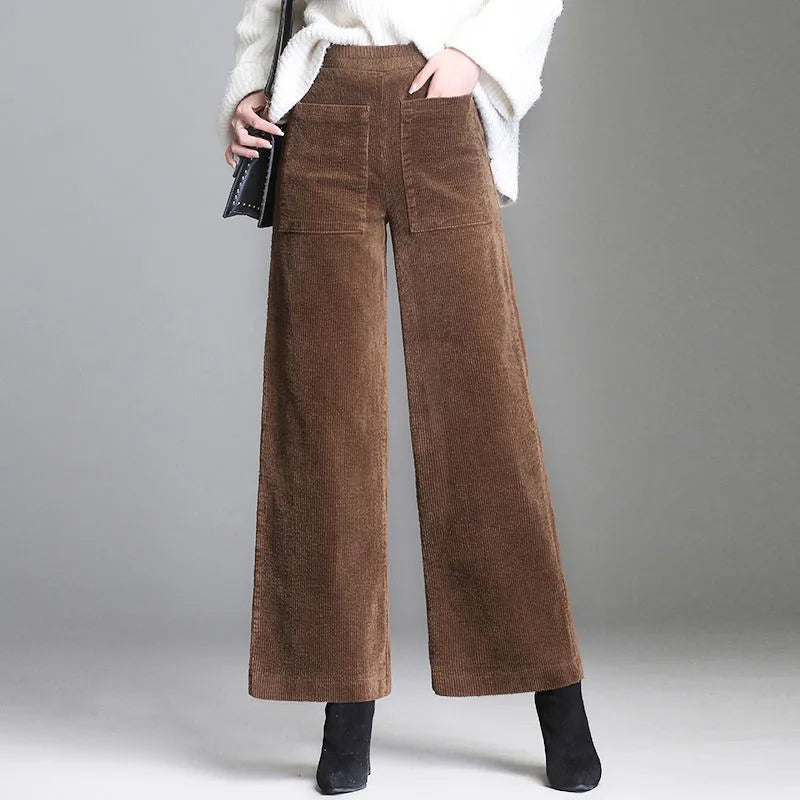 Deep burgundy women's high-waisted flare pants, blending retro style with comfortable, chic semi-formal wear.