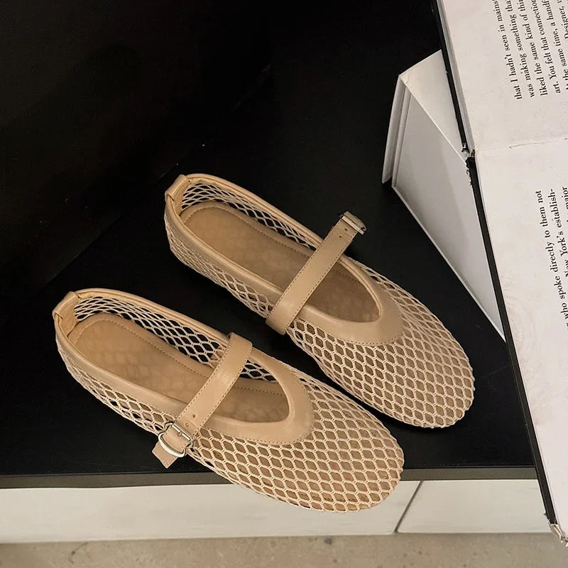 Slip-resistant women's mesh Mary Jane flats, comfortable with a breathable design & buckle closure.