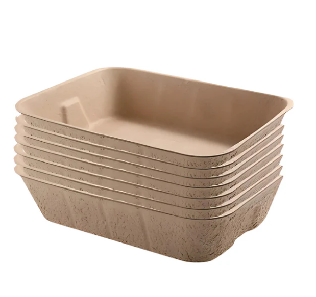 Close-up of a new biodegradable cat litter box, emphasizing its eco-friendly material and design.