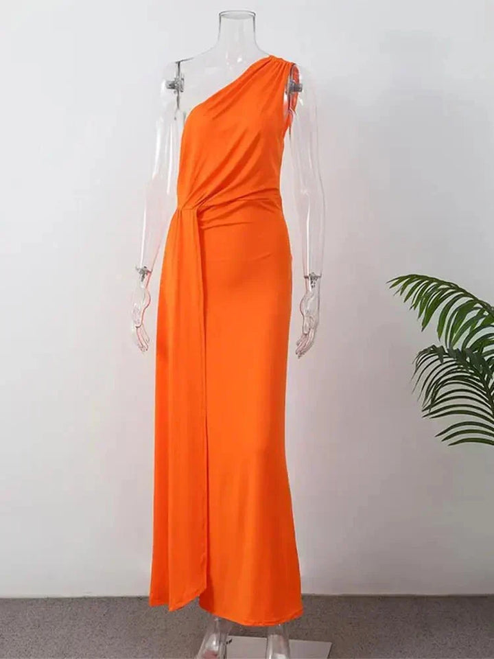 Women's sleeveless A-line wedding guest dress. Stylish formal cocktail party dress with flattering fit for special events.