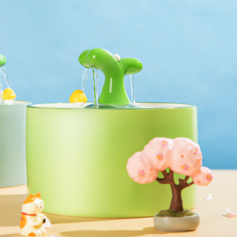 Elegant ceramic pet fountain with multi-level design, providing fresh filtered water for cats and dogs.