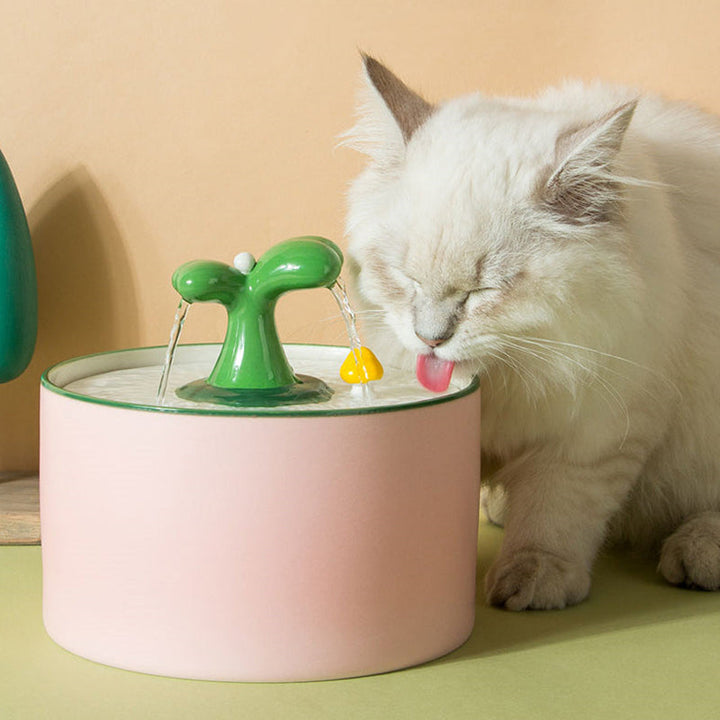 Stylish ceramic pet hydration station, designed for quiet operation and easy cleaning for pet owners.