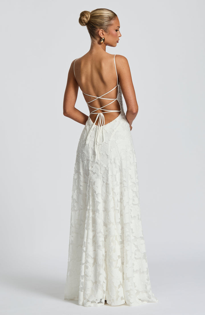 Women's elegant floral strappy A-line maxi dress, perfect for a sophisticated formal occasion or party.