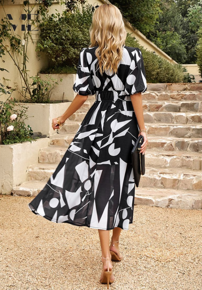 Pretty floral print midi dress for women, featuring puff sleeves, V-neck, and a flowy A-line.
