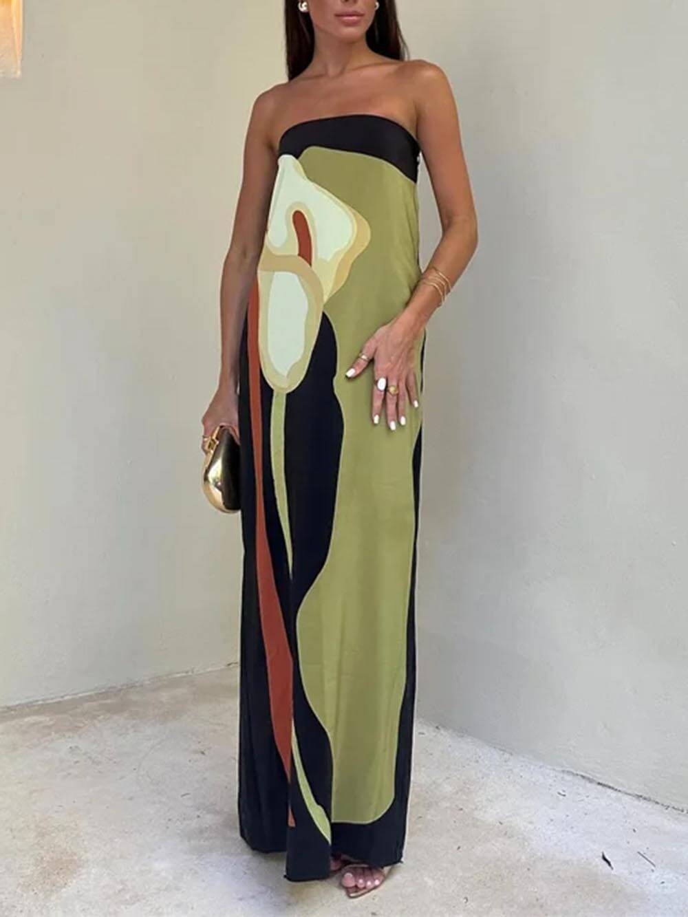 Stylish women's green maxi sundress, a comfortable sleeveless long dress for elegant summer fashion.
