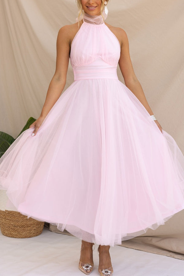 Elegant halter maxi dress for women, ideal as a wedding guest dress or a formal long evening gown.