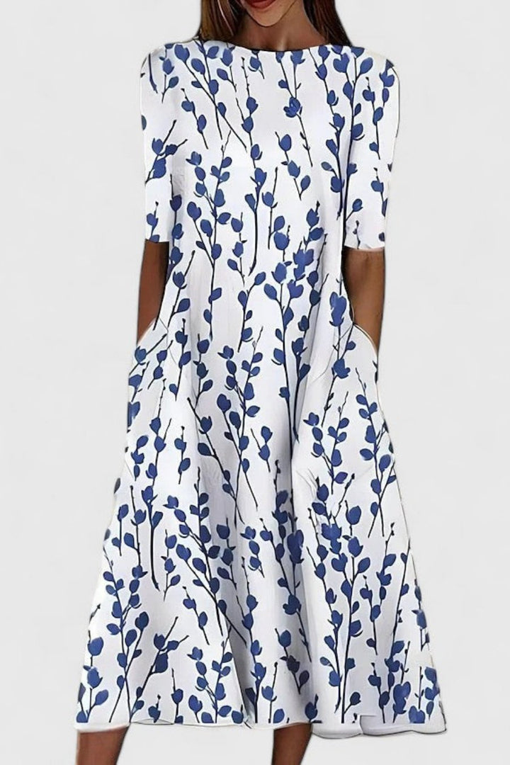 Chic dark blue A-line short-sleeve midi dress for women. Elegant occasion wear, comfortable & stylish.