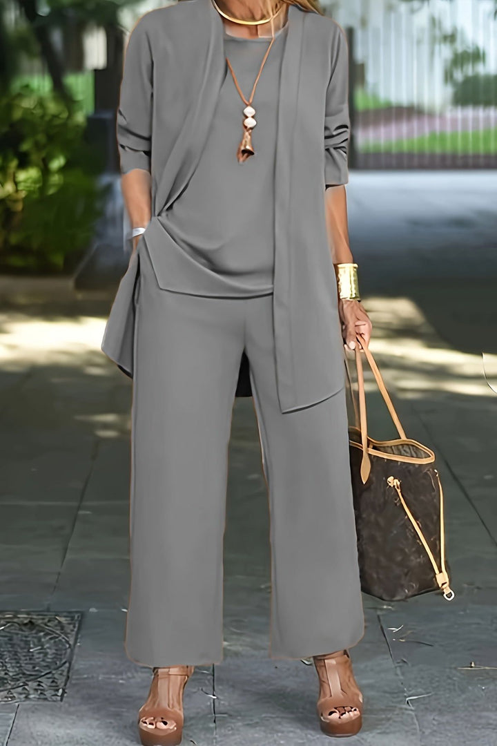 Stylish women's three-piece outfit set, elegant & comfortable for versatile office to casual wear.