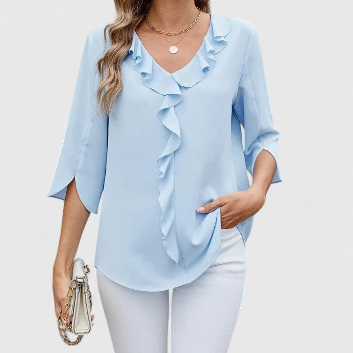 Elegant women's blouse for versatile styling, perfect for work or casual chic.