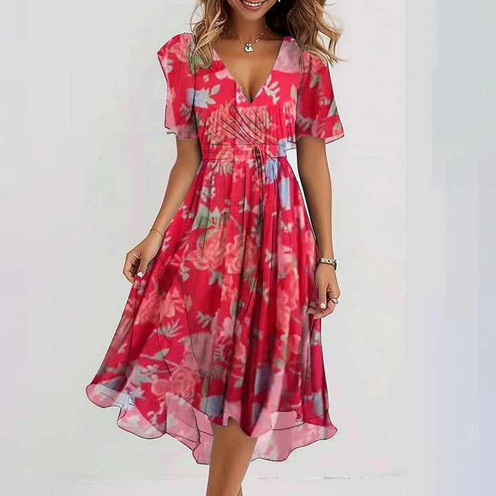 Stylish women's elegant floral midi wrap dress with flattering flutter sleeves. A beautiful occasion dress.