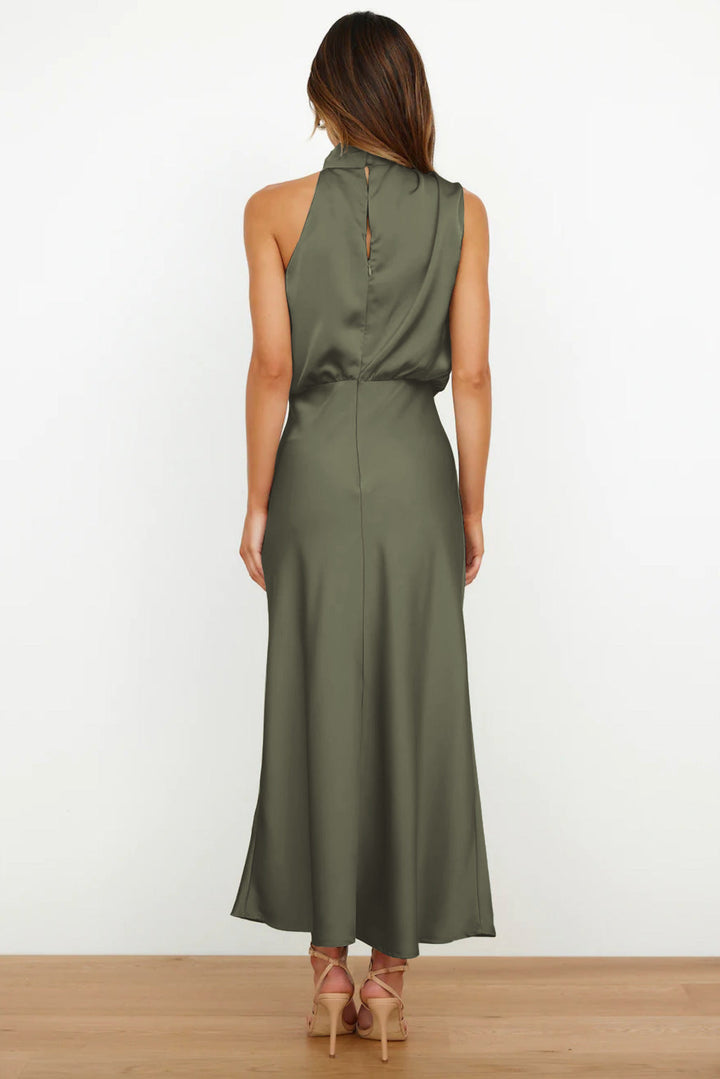 Formal women's attire: exquisite halter evening gown, open back, sweeping floor-length elegance.