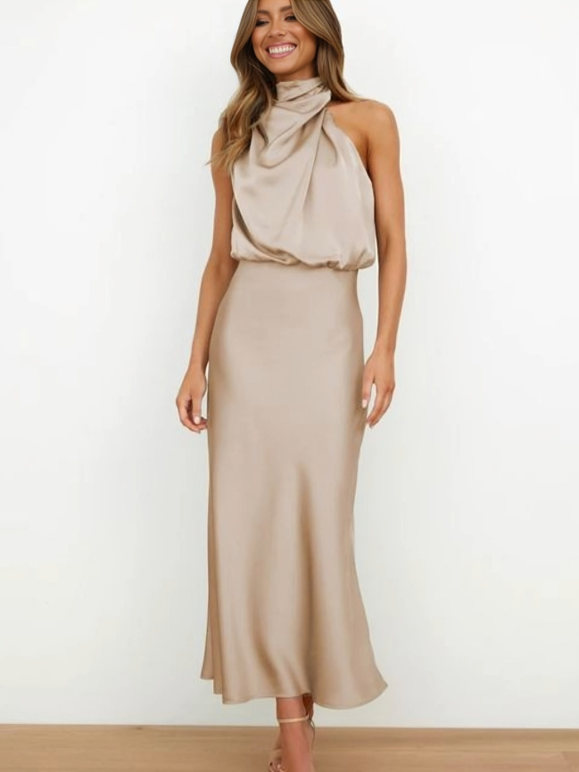 Sophisticated women's formal party dress, halter style, open back detail, long and elegant.
