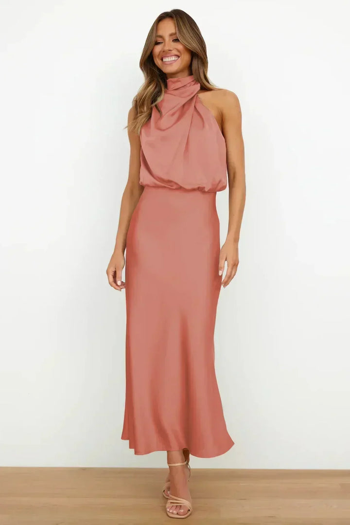 Sophisticated women's open back halter dress, floor-length, perfect for evening wear and events.