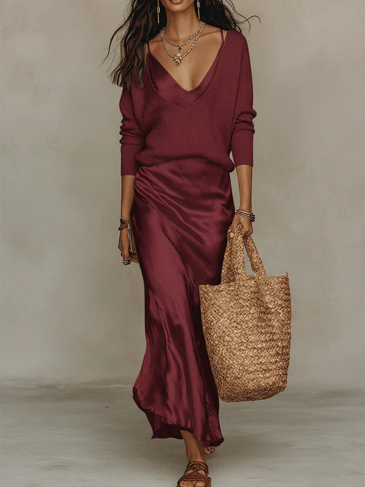 Modern women's elegant midi dress set with a cozy coordinated sweater, perfect for casual chic ensembles.