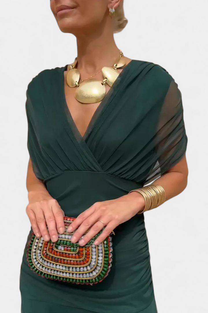 Women's off-shoulder formal maxi dress with elegant draping, ideal for any special occasion or party.