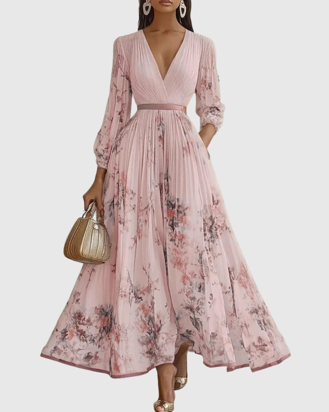 Women's elegant long sleeve pleated maxi dress in a beautiful floral design, perfect for parties.