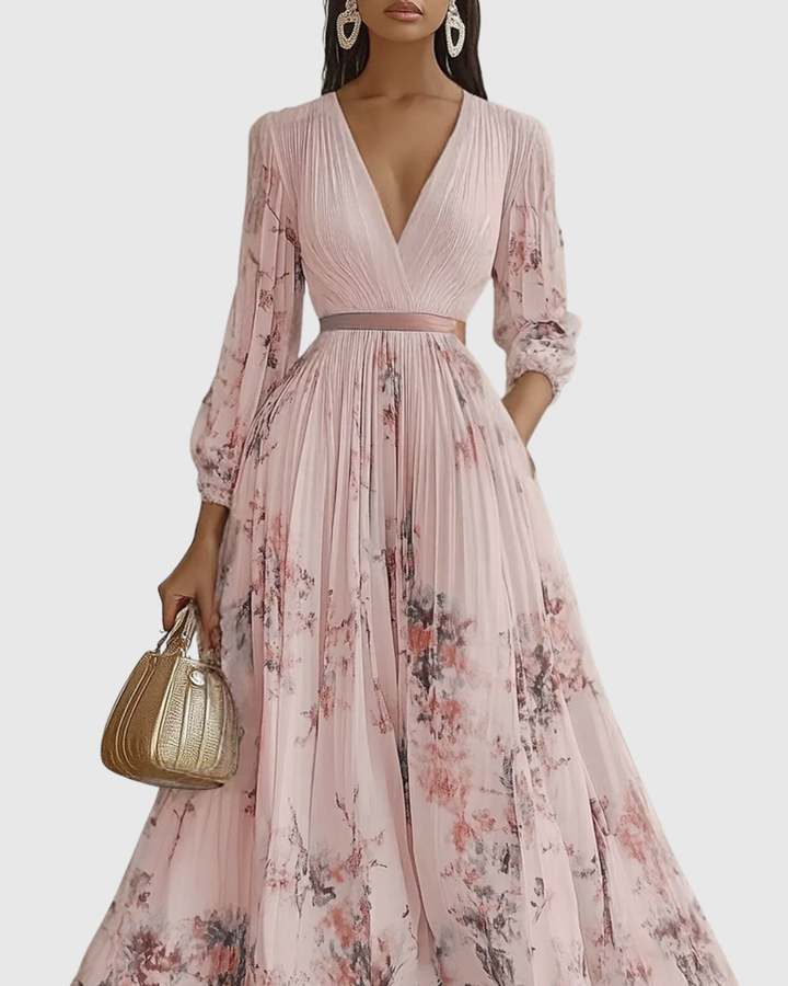 Versatile women's maxi dress: long sleeves, elegant pleats, and a flattering tie-waist detail.