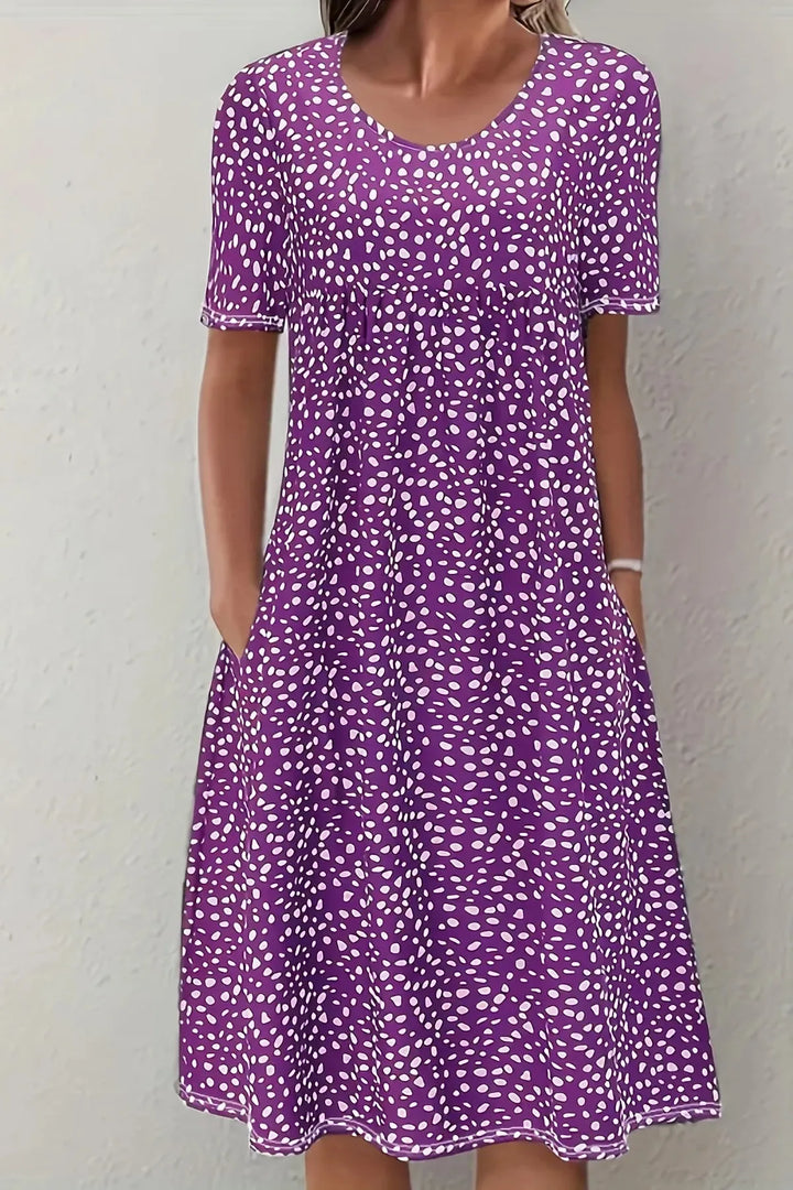 Comfortable & versatile green Women's Midi Dress, designed with a flattering pleated waist for an elegant silhouette.