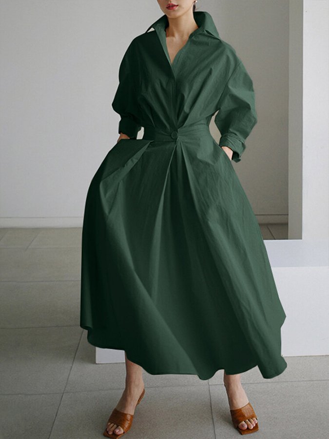 Sophisticated summer style: women's A-line maxi dress with puff sleeves and a distinctive twist waist.