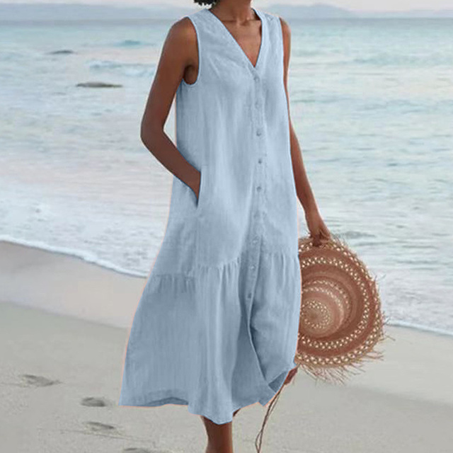 Sleeveless button-front midi dress for women, flattering and comfortable. Ideal for versatile summer fashion.