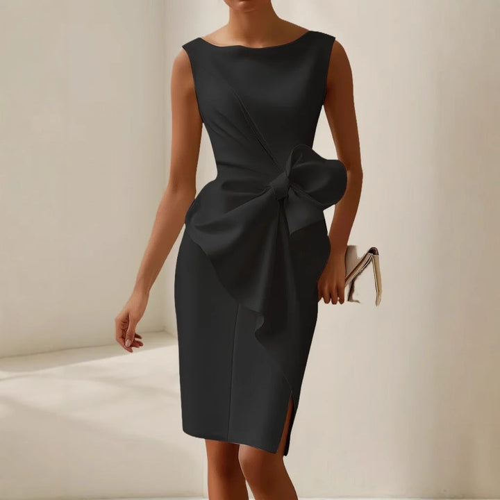 Women's elegant sleeveless midi dress for special occasions, with an asymmetrical cut and charming bow detail.