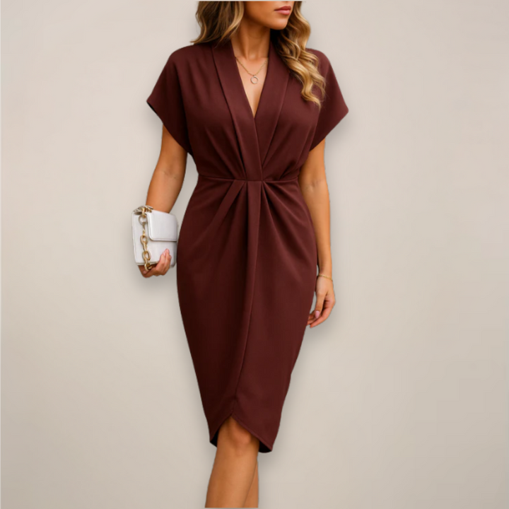 Sophisticated women's V-neck midi cocktail dress with a unique twist knot detail and short sleeves.
