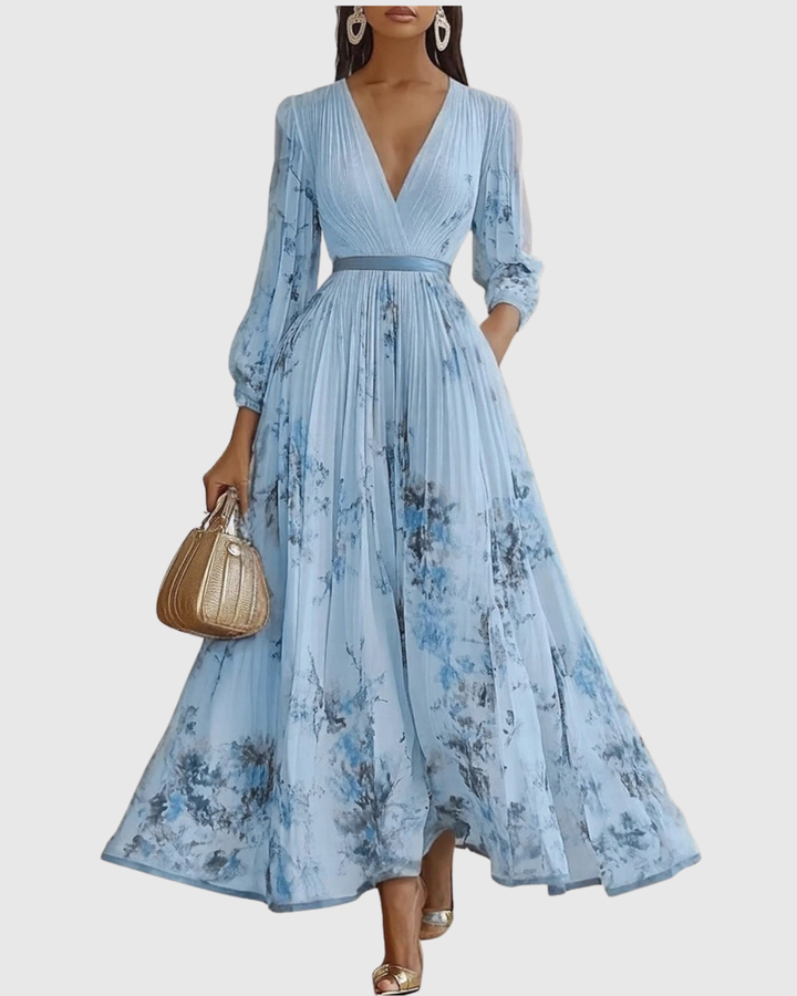 Close-up of elegant V-neck midi dress, highlighting the flattering neckline & comfortable, feminine style.