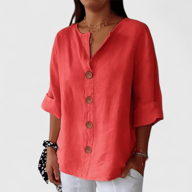 Stylish women's elegant V-neck blouse, button-down front, long sleeves, great for summer fashion.