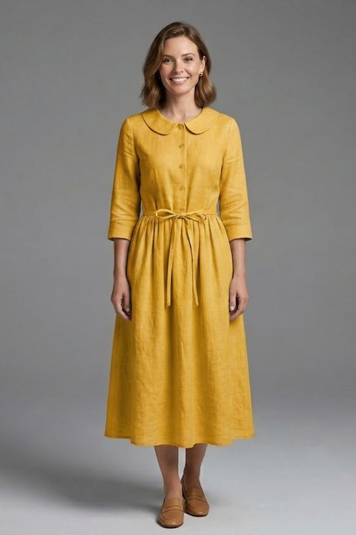 Comfortable V-neck midi dress for women, featuring an elegant waist tie. Versatile & flattering women's fashion.