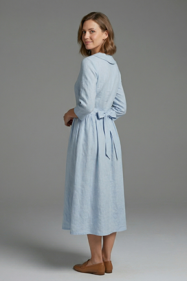 Chic women's V-neck midi dress with a waist tie, offering an elegant and comfortable fit. Versatile women's clothing.