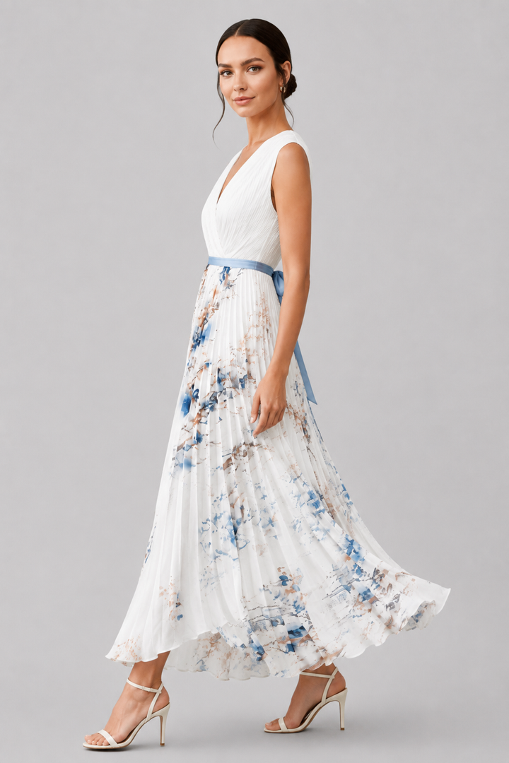 Flowy pleated maxi dress for women with a V-neckline and adjustable waist tie, ideal for evening wear.