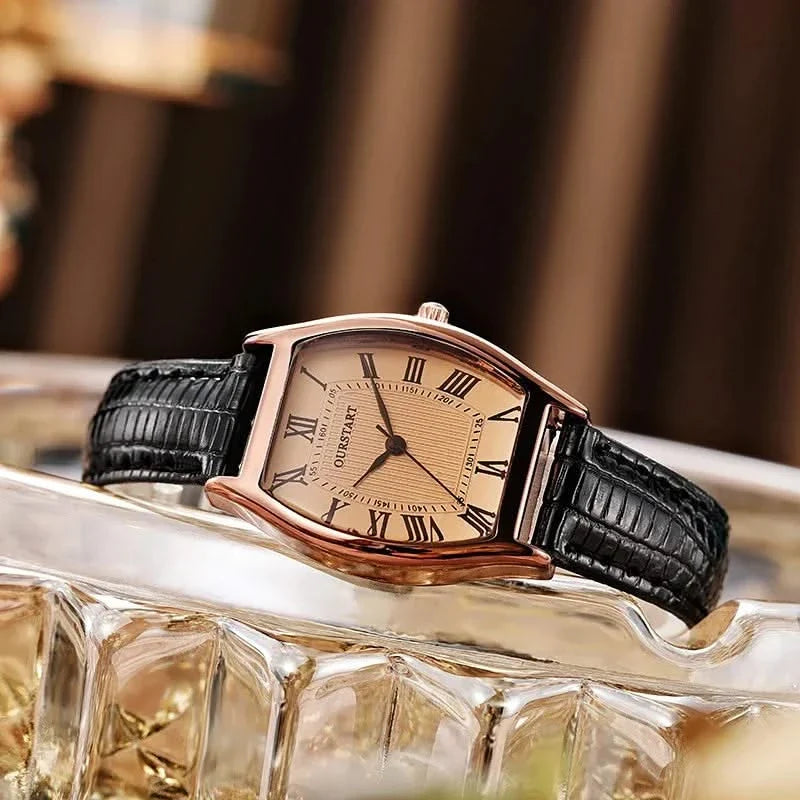 Women's brown wristwatch featuring elegant Roman numerals, classic analog display, and adjustable strap; a timeless gift.