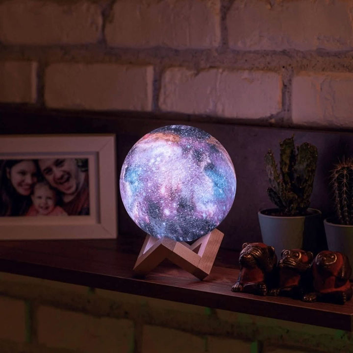 Decorative 16-color LED 3D moon lamp with wooden base, a unique gift and enchanting home decor piece.