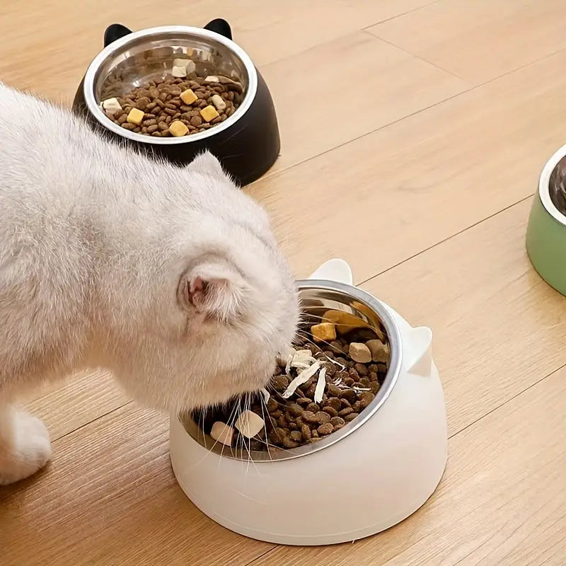 Ergonomic elevated cat food bowl, stainless steel, for healthy eating.