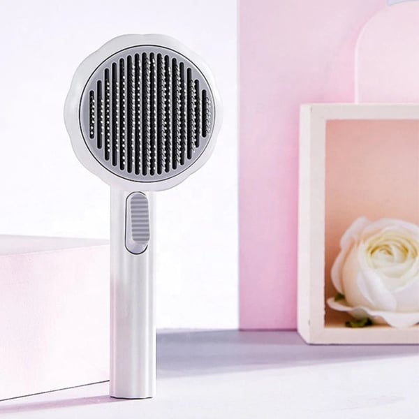 A dog enjoying a gentle grooming session with the ergonomic pet brush, promoting pet care and a healthy coat.