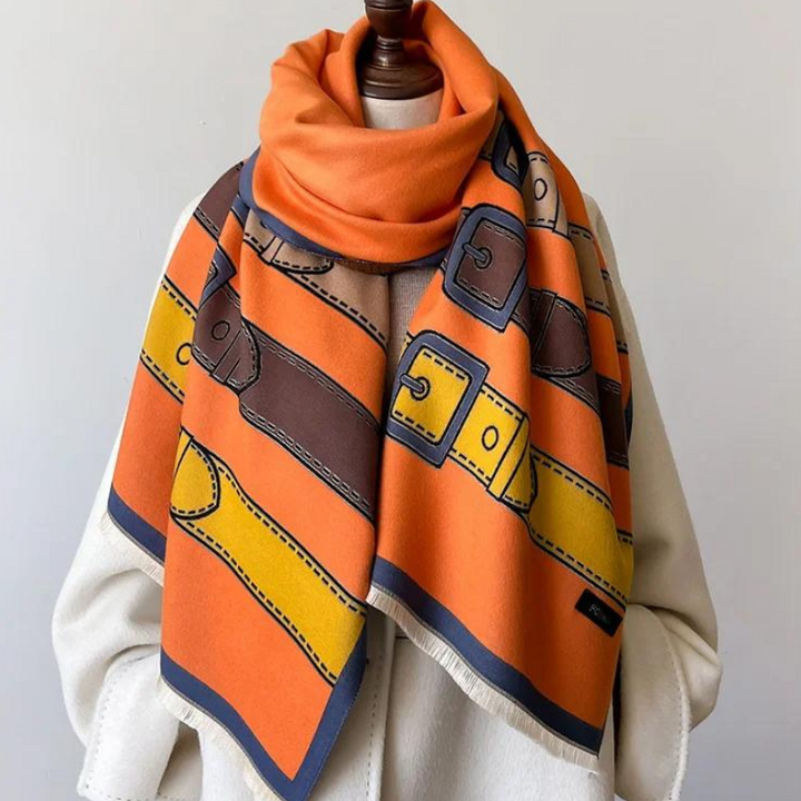 Incredibly soft cashmere blend scarf, a warm luxury wrap with an elegant design and belt buckle pattern.